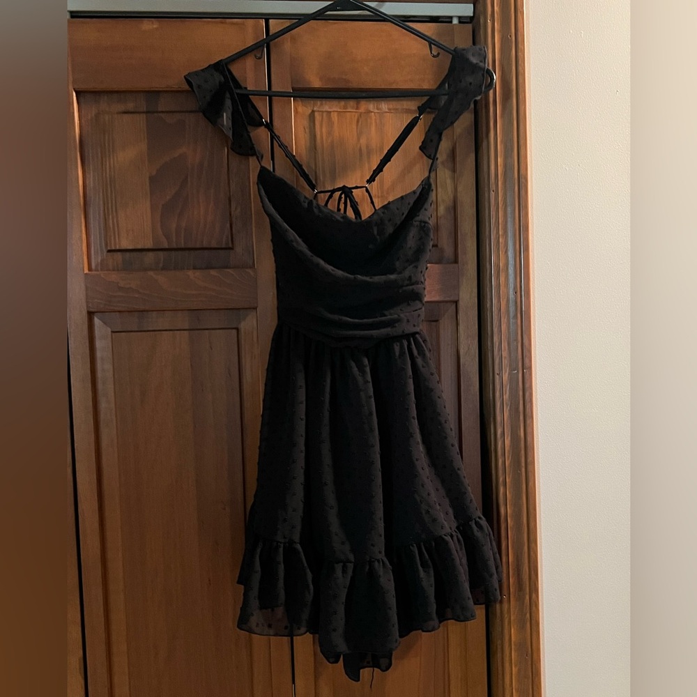 Black Lucy in the sky dress size medium never worn .